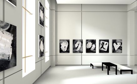 et rom med en benk og en vegg med kunst